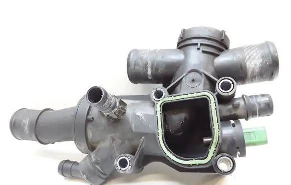 Thermostat/thermostat housing