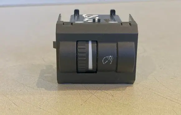 Panel lighting control switch