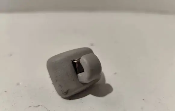 Sun visor clip/hook/bracket