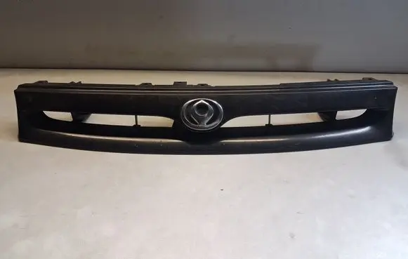 Mazda 626 Front bumper upper radiator grill