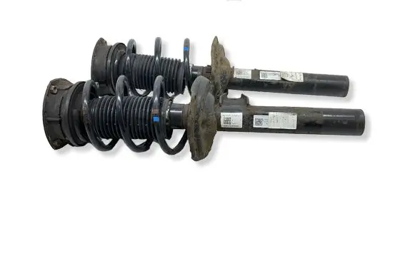 Volkswagen Golf VII Front shock absorber with coil spring 5Q0413023FJ 5Q0412014MG