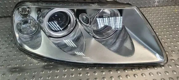 Volkswagen Touareg I Headlight/headlamp 7L6941016BJ