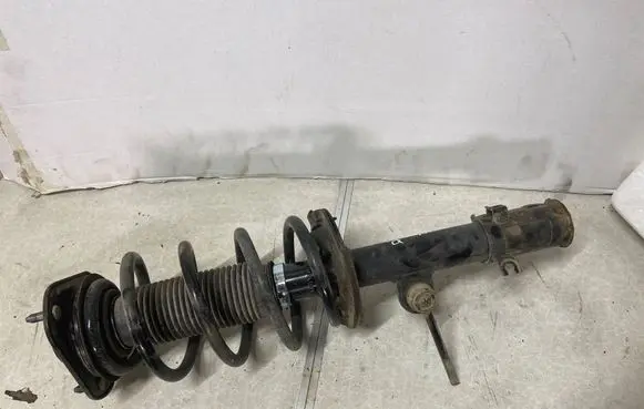 Front shock absorber with coil spring