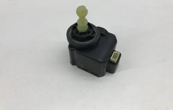 Volkswagen Golf VII Headlight level adjustment motor 010553 01055301