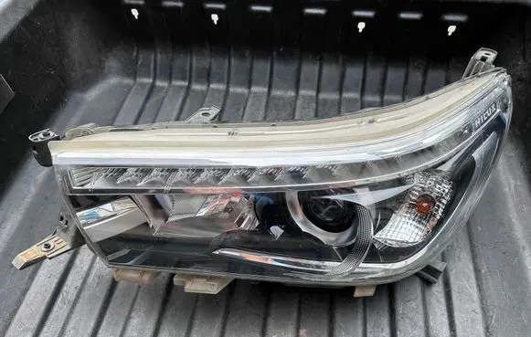 Toyota Hilux (AN120, AN130) Headlight/headlamp 811500K720 9922681017