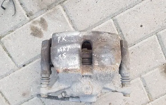 Volkswagen Golf VII Front brake caliper