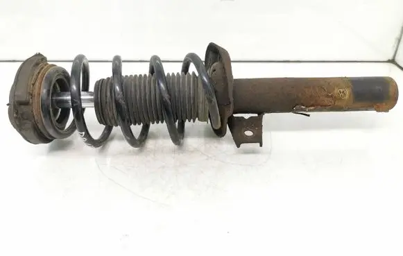 Volkswagen Touran I Front shock absorber with coil spring 1k0412331c