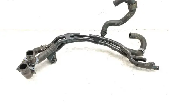 Volkswagen Golf VII Engine coolant pipe/hose 5Q0121065F 5Q0121064BM