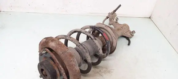 Nissan Primera Front shock absorber with coil spring