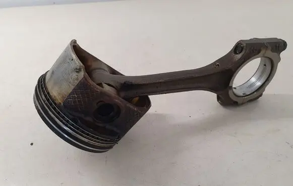 Piston with connecting rod