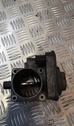 Volkswagen Golf IV Throttle valve 038128063c
