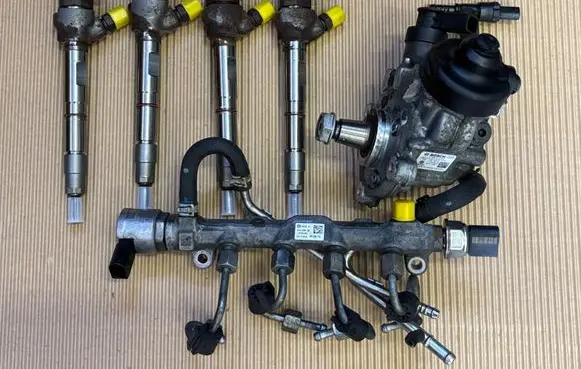 Volkswagen Caddy Fuel injectors set 04L130277AC 0445110469 04L130755D