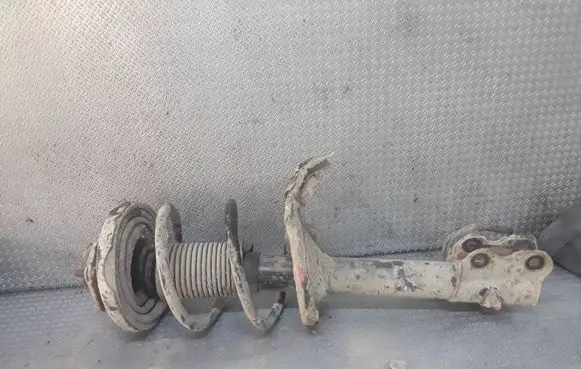 Nissan X-Trail T30 Front shock absorber with coil spring 