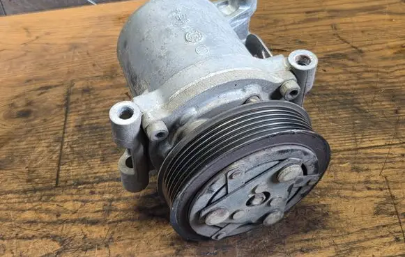 Opel Combo E Air conditioning (A/C) compressor (pump) 9810349980 9808860080 JSR11T603078