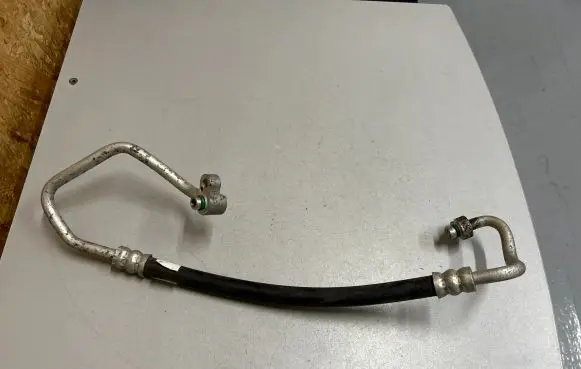 Hyundai i10 Air conditioning (A/C) pipe/hose 97762B9000
