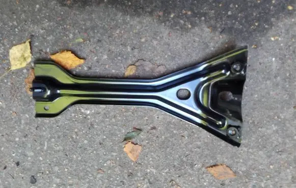 Radiator support slam panel bracket
