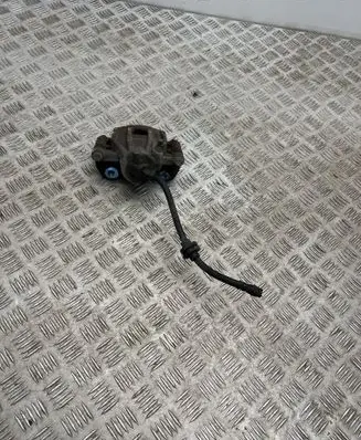 Dacia Spring Front brake caliper 
