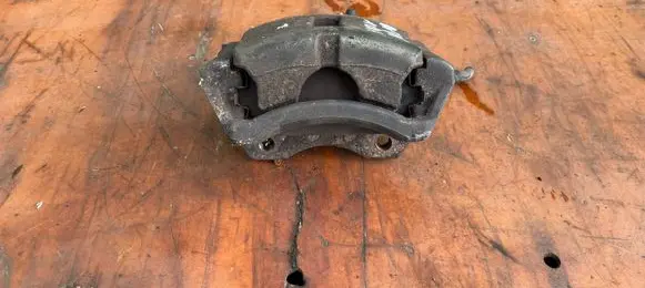 Nissan Primera Front brake caliper 25951