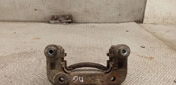 KIA Carens II Brake caliper pad carrier rear 