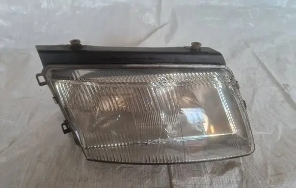 Volkswagen PASSAT B5 Headlight/headlamp 3B0941018M 13673709