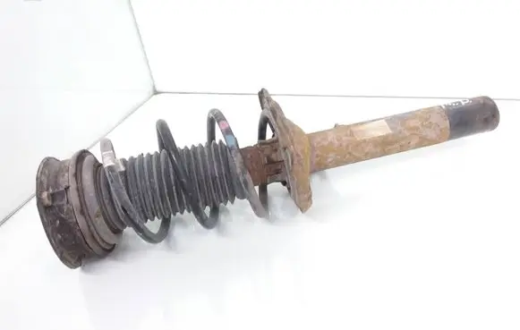 Volkswagen Golf VII Front shock absorber with coil spring 5Q0413023FH