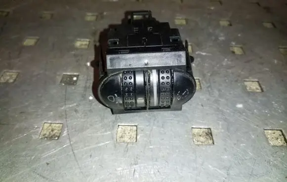Headlight level height control switch