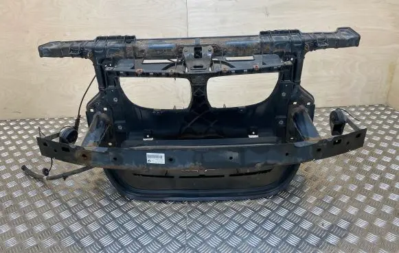 Radiator support slam panel