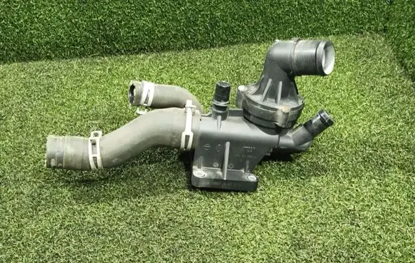 Thermostat/thermostat housing
