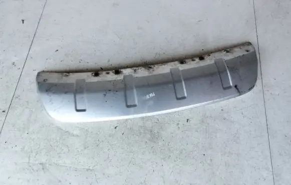 Rear bumper trim bar molding