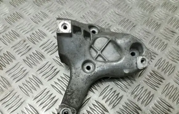 Volkswagen Golf V A/C compressor mount bracket 1K0260885B