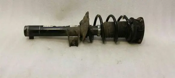 Volkswagen Golf VII Front shock absorber with coil spring 5Q0412037EF