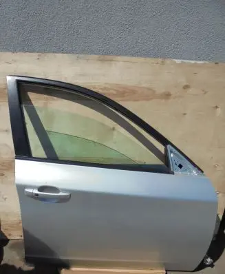 Subaru Impreza III Front door