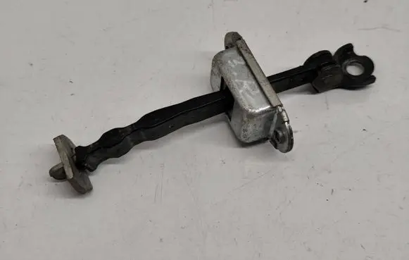 Nissan Note (E11) Rear door check strap stopper 