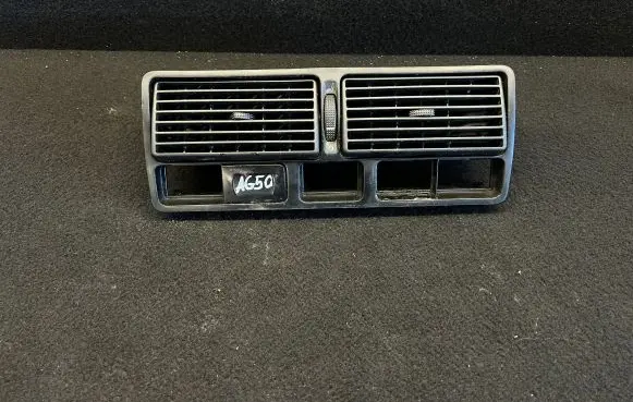 Volkswagen Golf IV Dash center air vent grill 1J0819728C