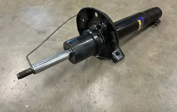 Volkswagen Caddy Front shock absorber/damper 1K0413031BB 1K0413031BA