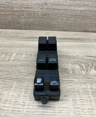 Nissan Primera Electric window control switch 25401AV640