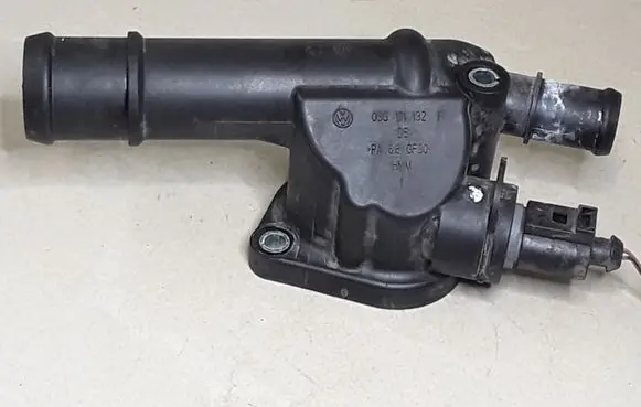 Thermostat/thermostat housing