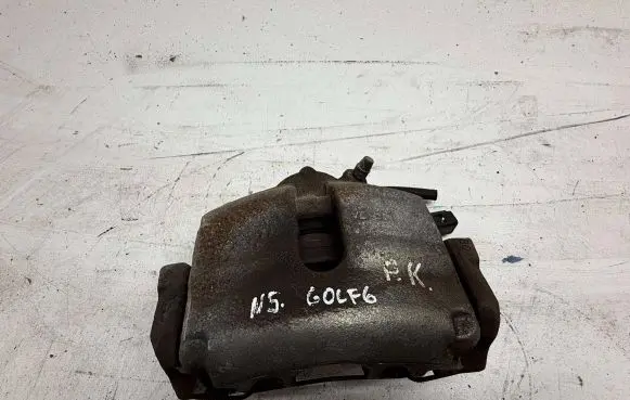 Volkswagen Golf VI Front brake caliper