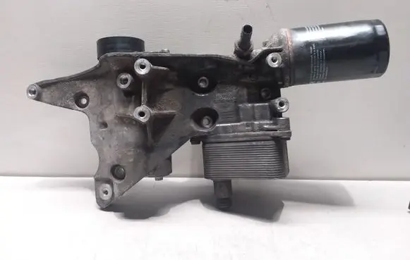 Skoda Octavia Mk2 (1Z) Oil filter mounting bracket 06J903143