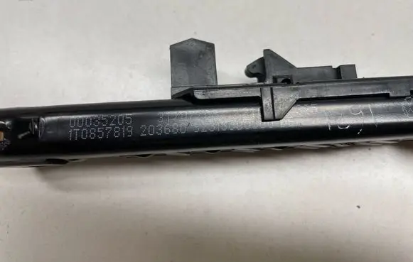 Volkswagen Tiguan Seat belt adjustment rail 1T0857819