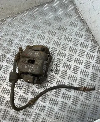 Suzuki Grand Vitara I Front brake caliper