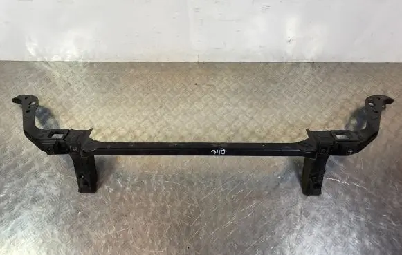 Top upper radiator support slam panel