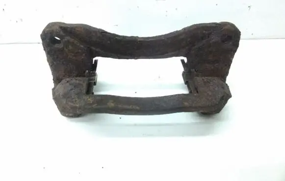 Subaru Legacy Brake caliper pad carrier rear 