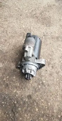 Volkswagen Touareg I Starter motor 070911023C