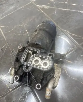Opel Zafira A Oil filter mounting bracket 90571672
