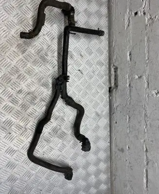 Volkswagen PASSAT B7 Engine coolant pipe/hose 03L121065AJ