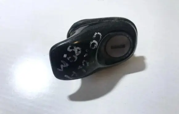 Toyota Corolla E90 Front door lock (next to the handle) 