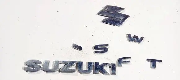 Suzuki Swift I Manufacturer badge logo/emblem 