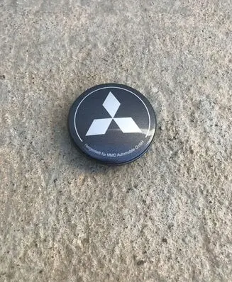 Mitsubishi Outlander Wheel nut cap/cover Z06L