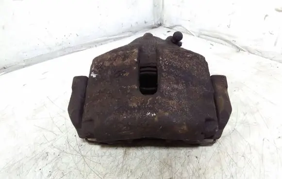 Volkswagen Golf VI Front brake caliper